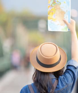 Traveler looking at a map